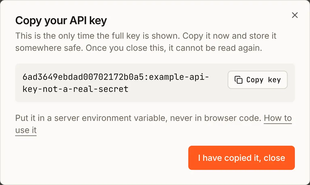 Copy your API key: the key, shown here as an example made of the organization ID, a colon and the secret, with a Copy key button, and the warning that it is shown only this once